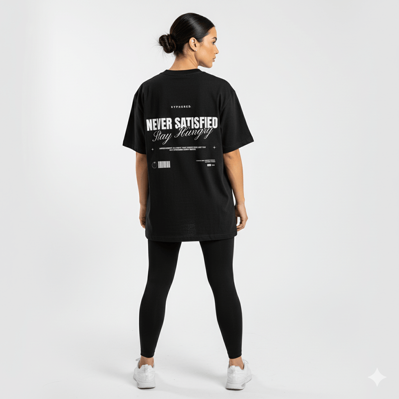 Women's Pump Cover Oversized T-Shirt featuring 'NEVER SATISFIED Stay Hungry' back print, stylish gym wear.